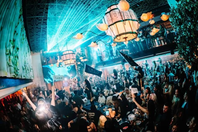 Crowded dance floor and laser lights at LAVO Party Brunch in Las Vegas