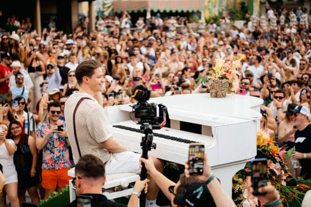 Palm Tree Beach Club Las Vegas — Kygo performing above the pool crowd